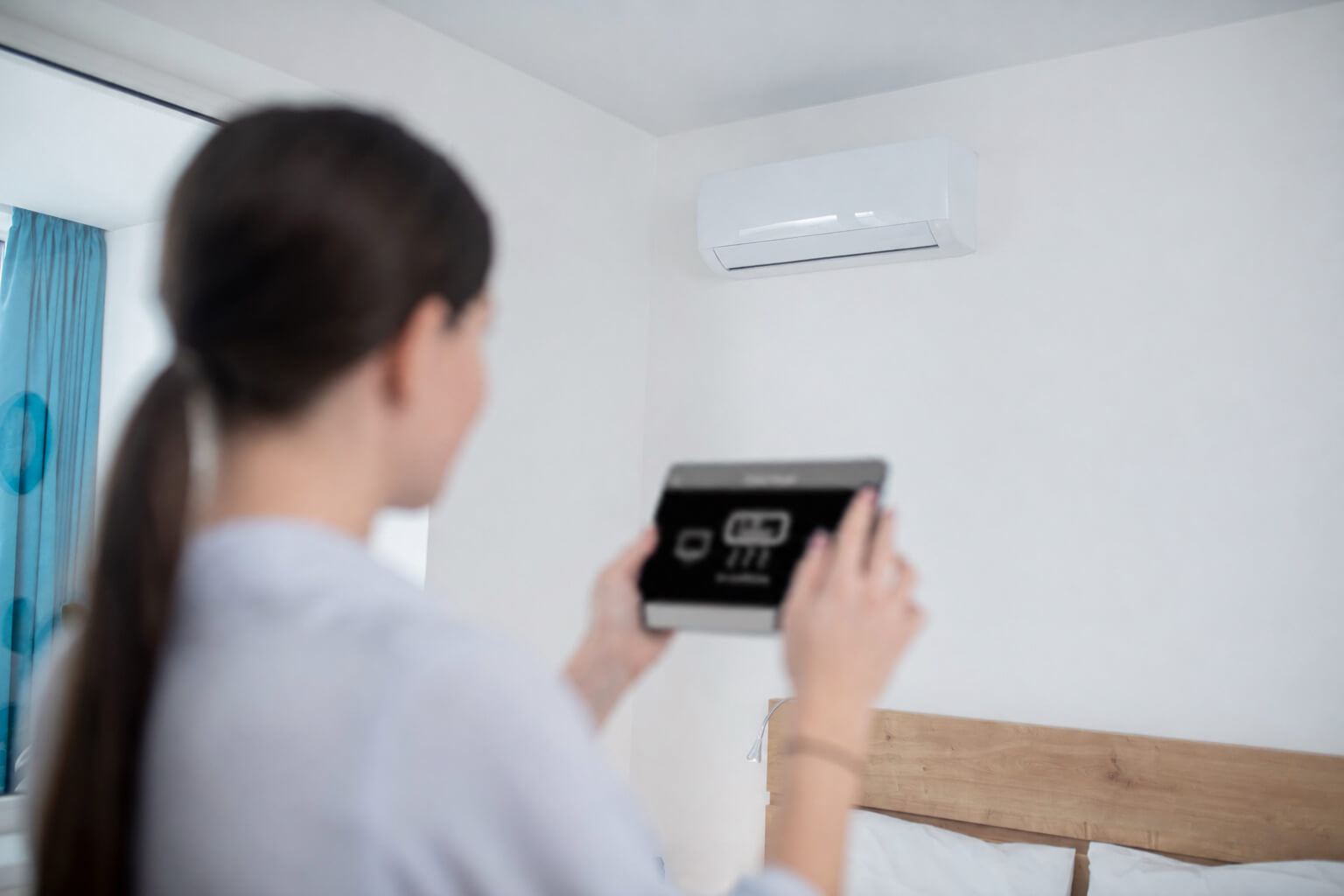 women using domestic air conditioning system